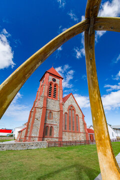 Blue whale mandibles frame Anglican Christ Church Cathedral in Stanley, Falkland Islands