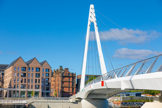 Govan-Partick Bridge spans River Clyde connecting areas in Glasgow with modern design and surroundings
