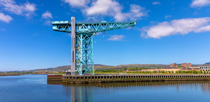 Clydebank Titan stands by the River Clyde showcasing industrial heritage in Clydebank Scotland