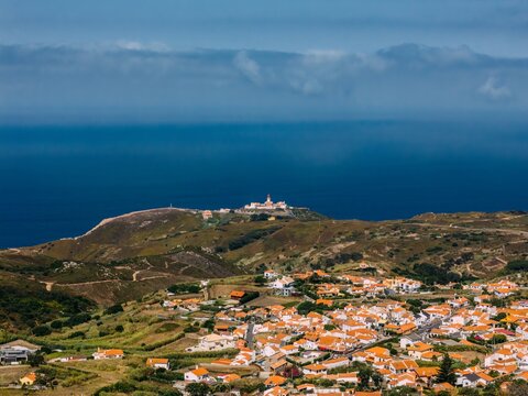 View of Cabo da Roca lighthouse and surrounding area from above in Portugal near Colares on a clear day near the Atlantic Ocean