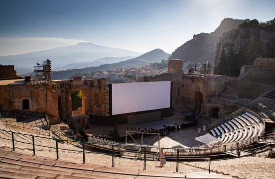 Empty white banner displayed in ancient theatre in Taormina, Sicily, showcasing historical architecture and open space