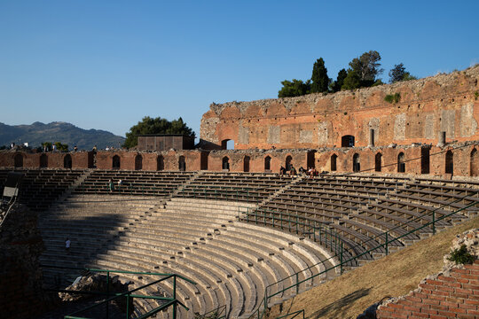 Empty white banner in the ancient theatre of Taormina, showcasing its historic structure and scenic backdrop