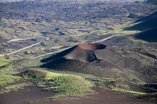 Explore the unique landscape of Etna volcano, with its vast, desert-like terrain and volcanic formations in Sicily, Italy