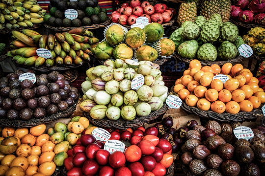 Exciting tropical fruit market offers a variety of exotic fruits in a bustling environment in Portugal