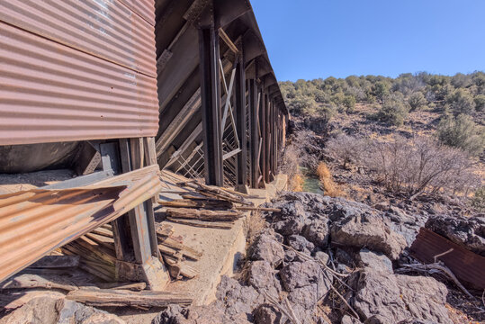 View from below Bainbridge Steel Dam in Kaibab National Forest near Ash Fork Arizona with historic significance