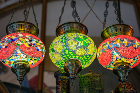 Colorful mosaic lamp chandeliers displayed in bazaar market of Izmir