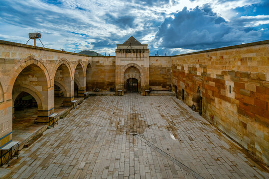 Explore Saruhan Caravanserai, a medieval lodge in Cappadocia with stone architecture and vast courtyard, located in Avanos, Turkey