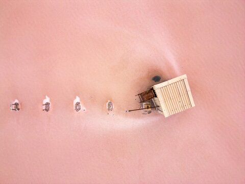 Drone view of house on Tuz salt lake surrounded by pink salt near Ankara Turkey
