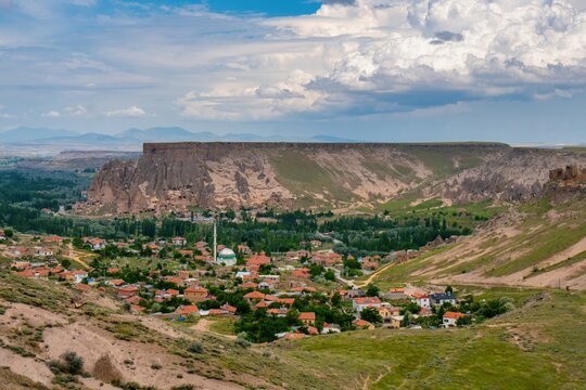 View of Yaprakhisar village in Cappadocia region of Turkey with surrounding mountains and valley