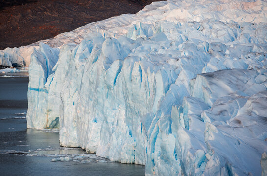 Massive glacier front of Perito Moreno in Parque Nacional Los Glaciares, Santa Cruz, Argentina showcases natural ice formations and water bodies