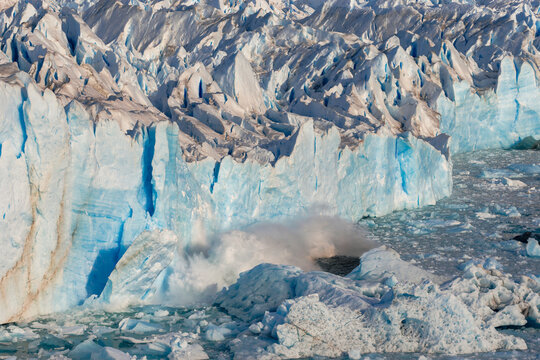 Block of ice breaks off from Perito Moreno glacier in Patagonia, creating a large splash in El Calafate region