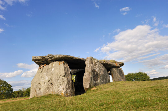 Exploring the Madeleine Megalithic Dolmen at Gennes in Maine-et-Loire, France during a sunny day