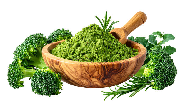 Wooden bowl of green powder with scoop surrounded by broccoli and sprigs