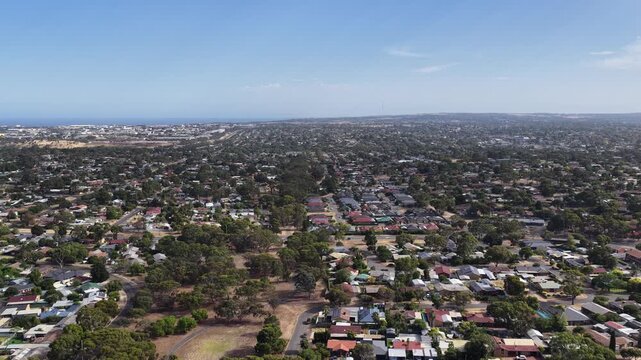 Hackham West, South Adelaide, South Australia: 4K aerial footage of residential suburb, houses, estates, streets, highways, traffic, urban infrastructure, near Noarlunga, Morphett Vale, Christie Downs