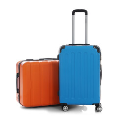 Fototapeta premium Two different stylish suitcases isolated on white