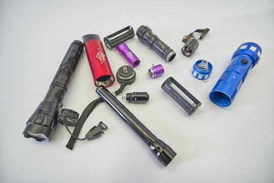 Suzano, Sao Paulo - Brazil - february 16, 2026: A varied collection of LED flashlights in a studio setting