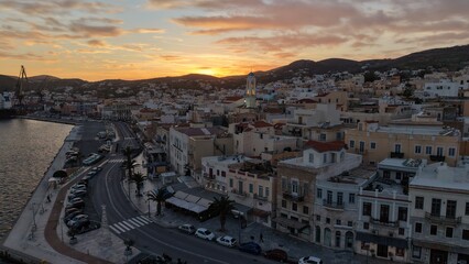 Fototapeta premium Golden Hour Aerial of Syros-Ermoupoli Coastal Road