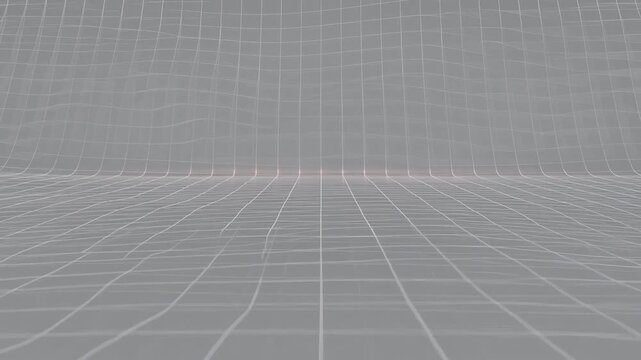 A futuristic grid pattern stretches out in perspective on a flat surface indoors.