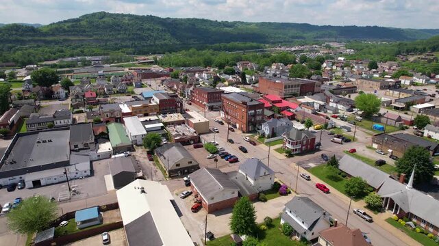 WEST VIRGINIA - 6.24.2024 - Great aerial footage passing over homes and businesses of Moundsville, West Virginia.