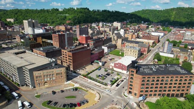 WEST VIRGINIA - 6.24.2024 - Very good aerial footage moving over churches and other buildings in Wheeling, West Virginia.