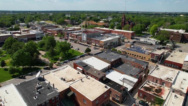 IOWA - 6.24.2024 - Fantastic aerial view approaching an old courthouse in Fairfield, Iowa.