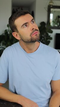 Man listening something weird around him 