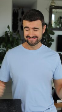 Man dancing to Latin music, shaking his shoulders and torso with great rhythm and movement