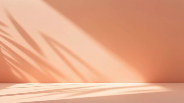 Empty room with sunlight and palm leaf shadows on a peachcolored wall and floor creating a serene and minimalist background for product display or abstract art.