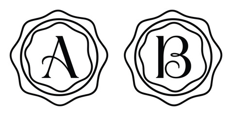Elegant ornamental circle frame set with capital letters a and b in sophisticated classic typeface © GoDesigner