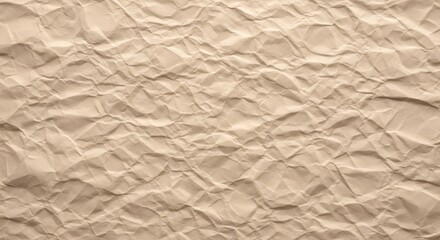 Obraz premium Textured crumpled beige paper background with