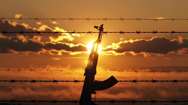 Sunset Silhouette AK47 Beyond Barbed Wire  Conflict with Hope, and Resilience.