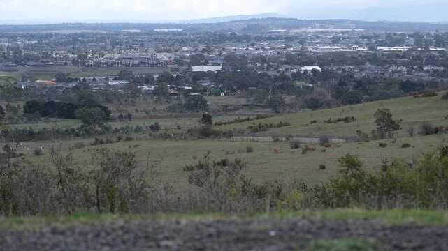 Panoramic view from Eagle Lookout overlooking Wolert and Epping suburban expansion in Melbourne Australia. Expanding suburbs, highlighting growth, land use change, and city outskirts transformation