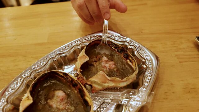 Japanese Grilled Crab Shell with Miso Paste Served on Silver Tray