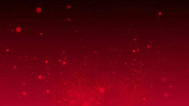 Abstract red background with glowing particles and bokeh effect