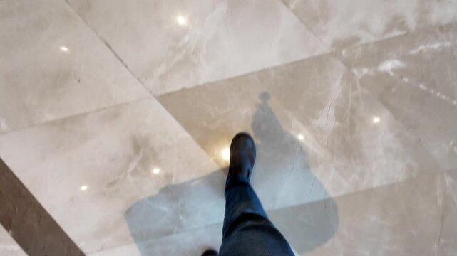 Walking in a modern building with marble floor