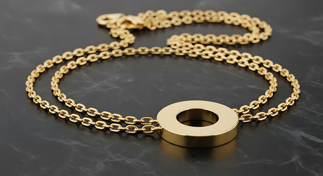 Elegant luxurious 14k gold chain necklace featuring a polished circular medallion pendant resting on a dark reflective charcoal stone surface in a high-end professional studio setup.