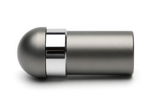 A silver bullet shaped object on a white background