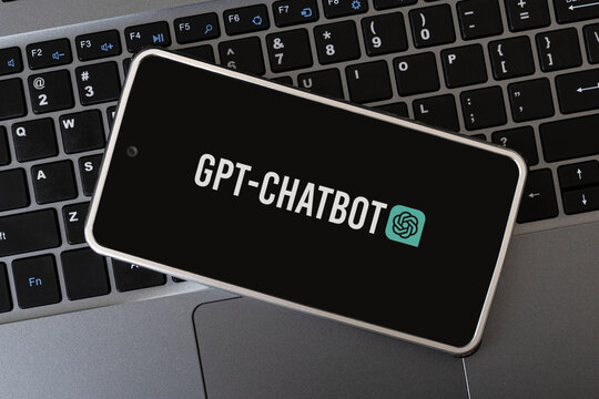GPT Chatbot logo seen on screen smartphone and laptop.