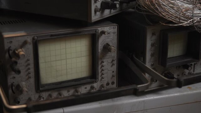 Scene Of Classic Electronics Laboratory Showcasing Aged Measurement Instruments And Bundled Cables . Media