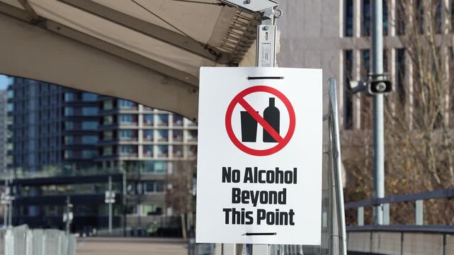 No alcohol allowed sign at outdoor event entrance, drinks regulation