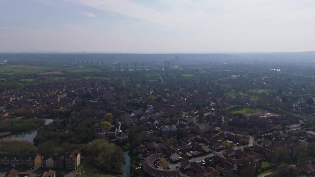Aerial view of Basildon, UK, cityscape showing buildings, homes, river and green spaces