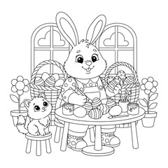 Easter bunny painting decorated eggs with kitten at table in cozy spring room © Crafter