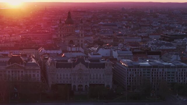 Budapest cityscape bathed in the warm light of a sunset glow.