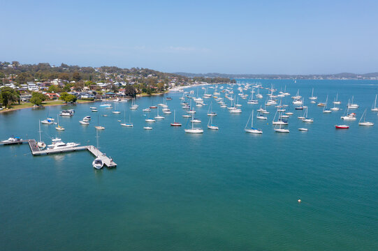 Croudace Bay - Lake Macquarie NSW Australia - Aerial view of lake side with moored boats