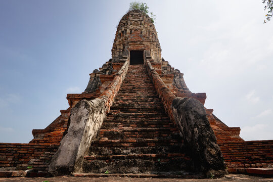 Wat Chaiwatthanaram ruin temple against the blue sky. in Ayutthaya, Thailand. ancient capital of kingdom siam.