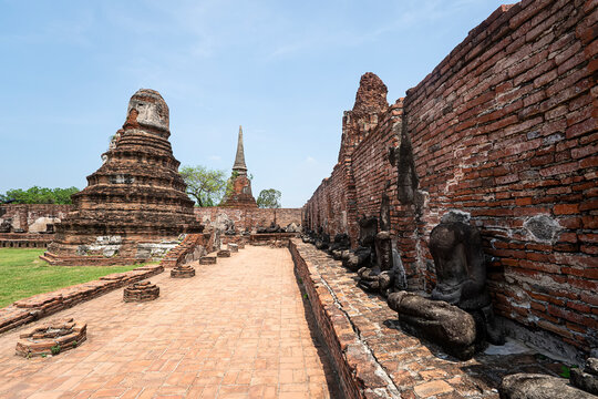 Ayutthaya is the ancient ruined capital of kingdom Siam. Ruins of pagodas in an ancient Buddhist temple.