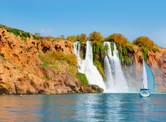 Naklejka premium Powerful upper Düden waterfall, a water stream breaks from a high cliff - Antalya, Turkey