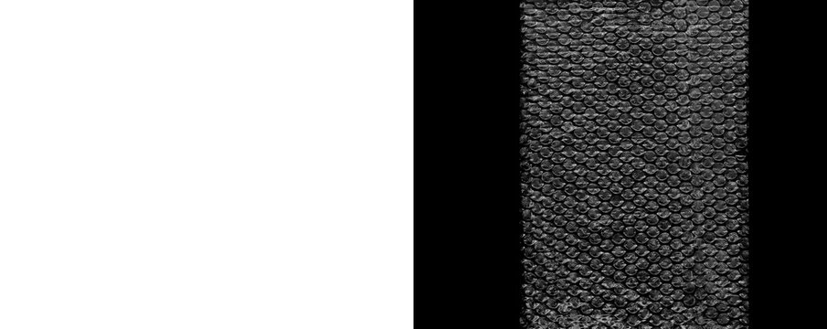 Textured bubble wrap surface with air bubbles for protective packaging.