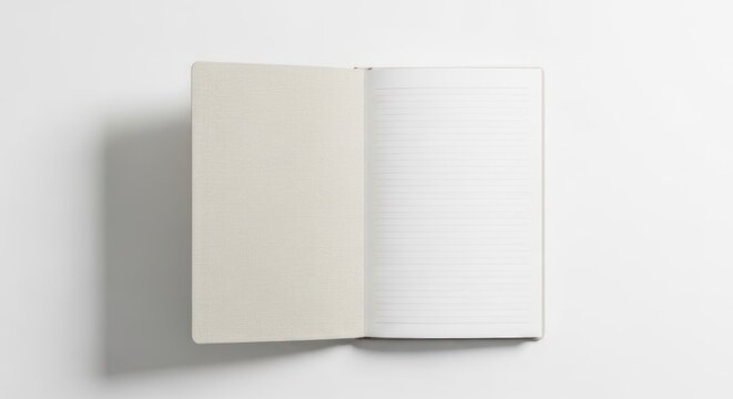 An open notebook with blank pages, lying flat on a plain white surface. The notebook is unmarked and the pages are lined, suggesting a clean and minimalistic setting.