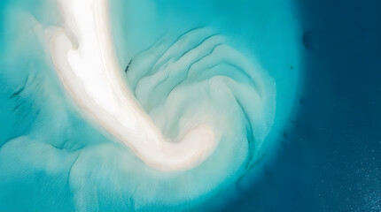 Fototapeta premium Abstract aerial view of swirling turquoise water and sandbar, creating a beautiful natural pattern and texture